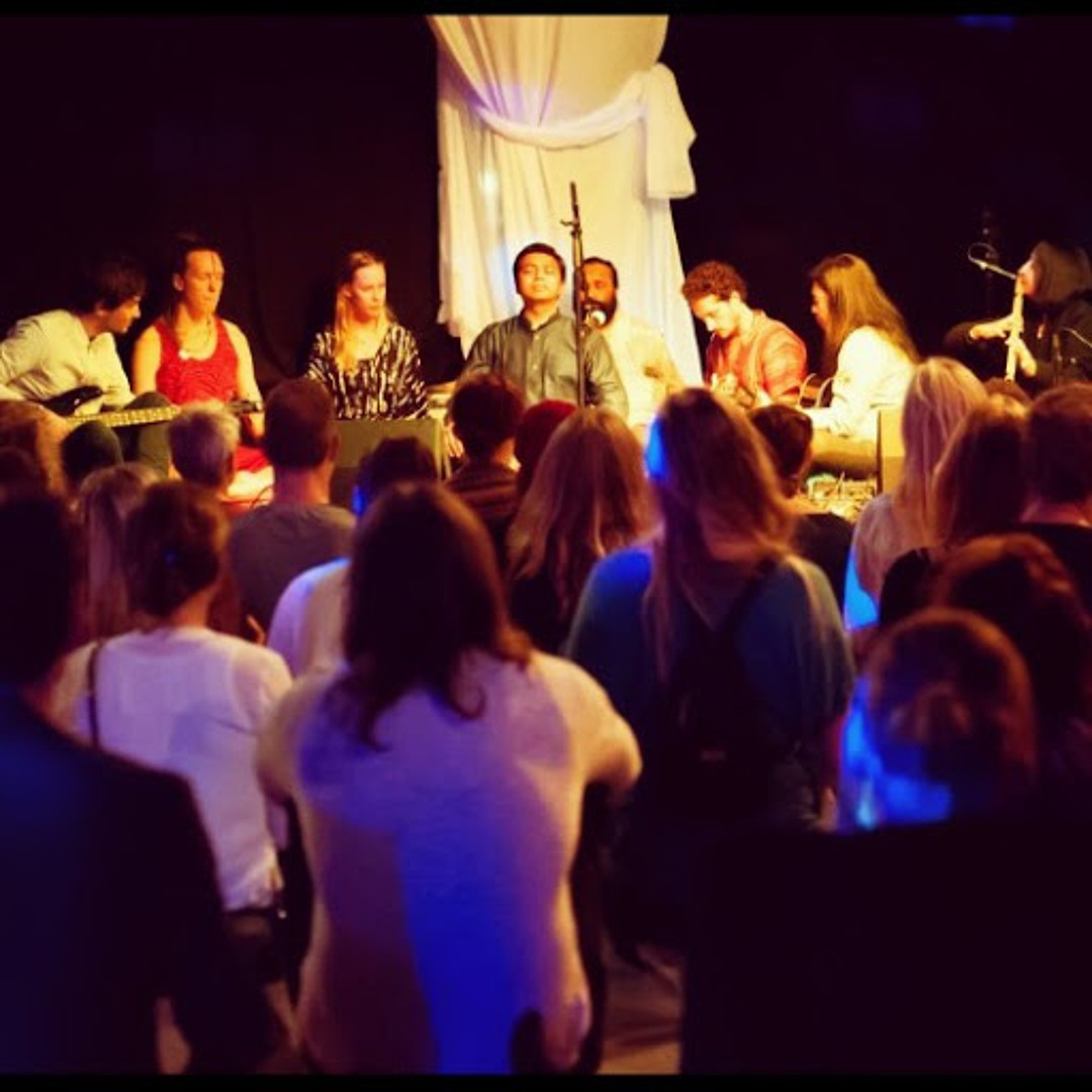 Shantonu Deva performing with a live ensemble